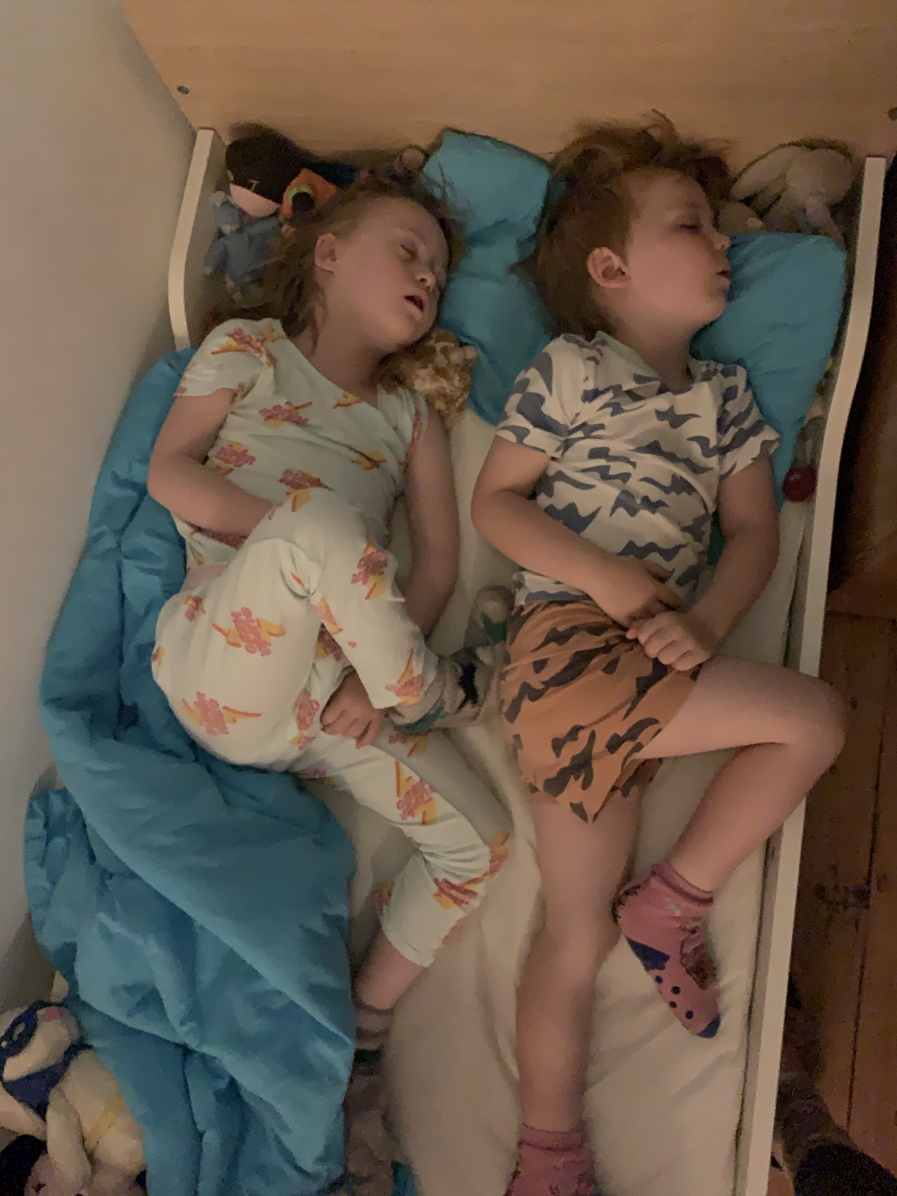 Sister and brother asleep
